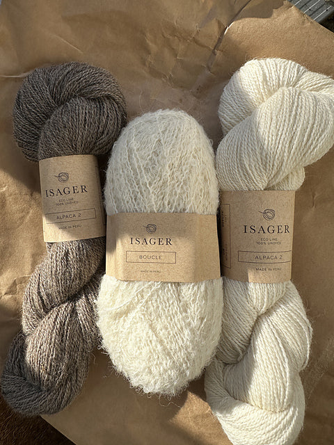 Alpaca2 i farve 7s og e0 sammen med Bouclé i e0.