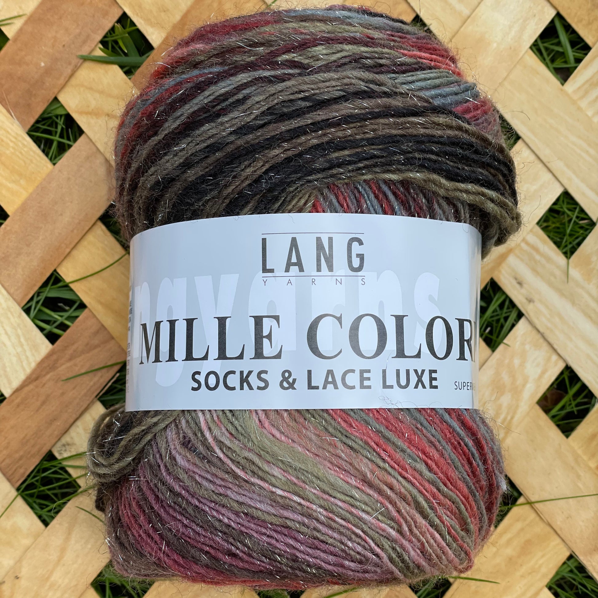 Mille Colori Socks and Lace Luxe - strømpegarn med flot farveskifte og diskret glimmertråd.