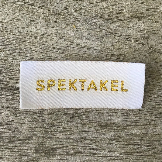 "Spektakelstrik Guld" label