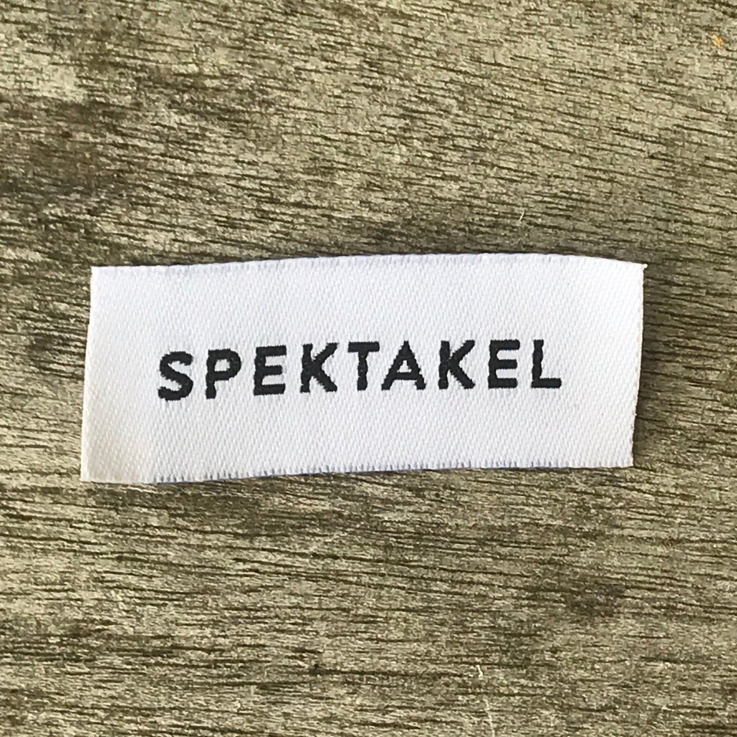 "Spektakelstrik sort" label